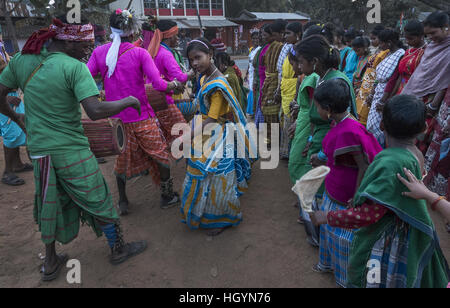 Kolkata, Indian state West Bengal. 13th Jan, 2017. Indian tribal people take part in a traditional group dance on the eve of Makar Sankranti, a holy day of the Hindu calendar at Daranda village, some 180km away from Kolkata, capital of eastern Indian state West Bengal, Jan. 13, 2017. Makar Sankranti, which marks transition of the sun into the zodiacal sign of Makara (Capricorn) on its celestial path, is a Hindus festival celebrated in almost all parts of India. © Tumpa Mondal/Xinhua/Alamy Live News Stock Photo