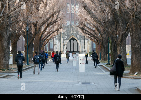 Tokyo, Japan. 14th Jan, 2017. A Japanese student arrives at Tokyo University to sit national university admission tests in Tokyo, Japan. This year 575,966 high school students will take the tests across 691 test centers nationwide over the weekend of January 14-15. Credit: Aflo Co. Ltd./Alamy Live News Stock Photo