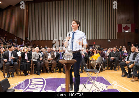 London, Canada, 13th January, 2017. Justin Trudeau, Prime Minister of Canada, answers to a question in a town hall Q&A in the Alumni Hall of London's University of Western Ontario. London was one of his stops as part of his cross-country tour. Credit: Rubens Alarcon/Alamy Live News Stock Photo