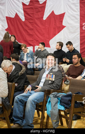 London, Ontario, Canada, 13th January, 2017. Members of the audience wait for the Prime Minister of Canada, before the start of a town hall Q&A. London was one of the Prime Minister's stops as part of his cross-country tour. Credit: Rubens Alarcon/Alamy Live News Stock Photo