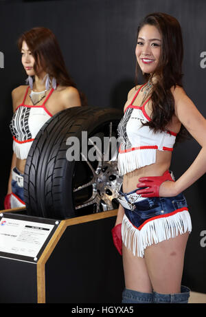Chiba, Japan. 13th Jan, 2017. Models pose for photo at the Tokyo Auto Salon 2017 in Chiba, suburban Tokyo on Friday, January 13, 2017. More than 400 automakers and auto parts makers exhibit their latest products at a three-day custom cars and racing cars exhibition. © Yoshio Tsunoda/AFLO/Alamy Live News Stock Photo
