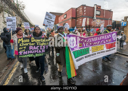 London, UK. 14th January 2017. Zimbabweans support the Movement for Justice march through Brixton communities against mass deportations and demanding that Nigeria, Ghana, Jamaica, Pakistan and Afghanistan end their collusion with the racist UK government. Credit: Peter Marshall/Alamy Live News Stock Photo