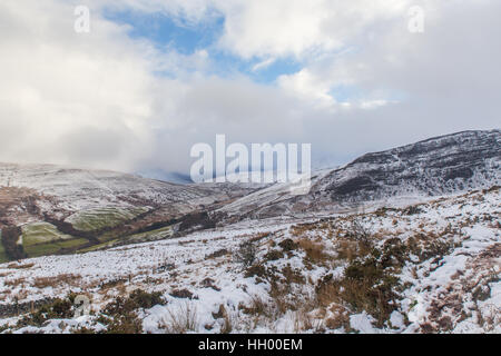 Brecon Beacons, UK. 14th Jan, 2017. The Brecon Beacons were covered in a thin layer of slushy snow.Temperatures hovered at around 2 degrees Centigrade as low cloud shrouded the mountain tops in London, UK. Credit: Chris Stevenson/Alamy Live News Stock Photo