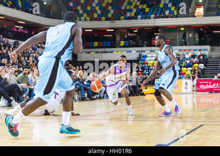 London, UK. 14th January, 2017. Lions' Kevin Moyo (10) on the attack. Tensions run high in the BBL Trophy basketball game between home team London Lions and visitors Surrey Scorchers as both teams try to get to the next round of the Trophy. Scorchers pinch the game in the last 20 seconds and win 88-87 over the Lions. Credit: Imageplotter News and Sports/Alamy Live News Stock Photo