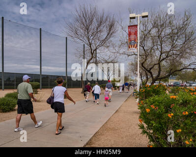 Fans walk to the entrance, of the Maryvale Baseball Park, Phoenix, Arizona. Stock Photo