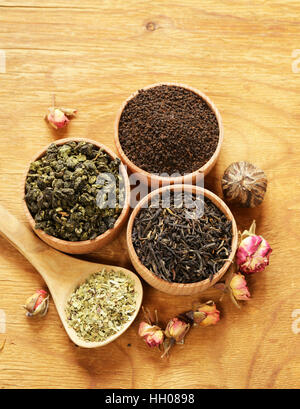 Different types of tea in a wooden bowl Stock Photo