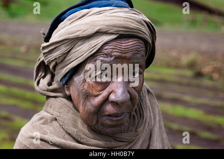 Simien Mountains National Park, Amhara region, North Ethiopia. A local woman walks among the slopes of the Simien Mountains. The Simien Mountains, loc Stock Photo