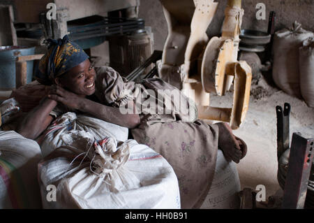 Adwa village, Tigray Region, Ethiopia. Interior of an old grain mill where women work, in the village of Atwa, where cereals are converted into flour. Stock Photo