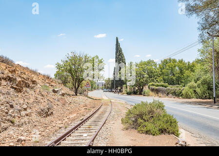 FAURESMITH, SOUTH AFRICA - DECEMBER 31, 2016: A street scene in Fauresmith, one of only three towns on earth where the railway line runs down the cent Stock Photo