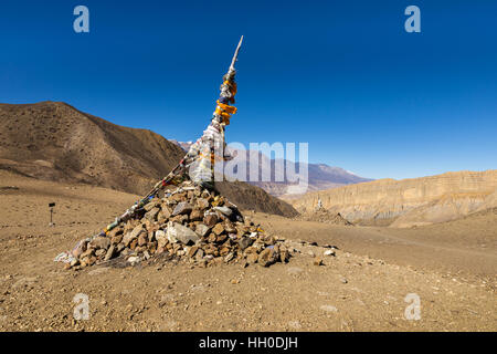 Traditional Tibetan pile and colored flags on the pass, Himalayas, Nepal Stock Photo