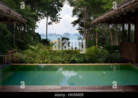 Six Senses Resort, Koh Yao Noi, Phang Nga Bay, Thailand, Asia.  Private swimming pool, infinity-edged pool with a double spa sala on the pool deck for Stock Photo