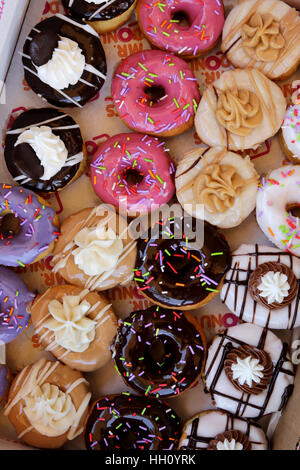 Sugar coated colorful doughnuts Stock Photo