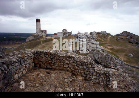 rocks and ruined medieval castle in Olsztyn, Poland Stock Photo