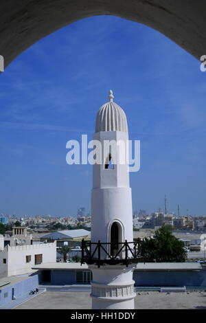 Minaret of Al Khamis Mosque, the oldest mosque in the Kingdom of  Bahrain Stock Photo