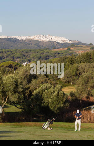 Golfer at golf course, Montenmedio Golf and Country Club, behind Vejer de la Frontera, Cadiz province, Andalusia, Spain Stock Photo