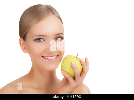 Smiling beauty woman holding green apple while isolated on white Stock Photo