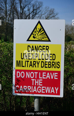 Warning notice sign Danger Unexploded ordnance on this beach it may ...