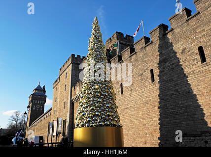 Gold golden baubles on civic Christmas Tree outside Cardiff Castle in city centre Wales UK  KATHY DEWITT Stock Photo