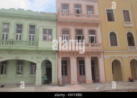 pastel colour houses being renovated in Havana Cuba Stock Photo