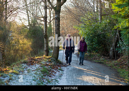 Walkers  on the Deeside way at Cults, Aberdeen. Former Royal Deeside Railway line running from Aberdeen to Ballater in Scotland Stock Photo