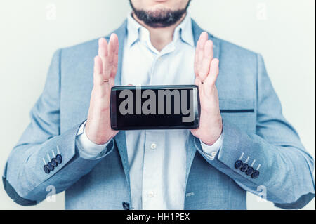 New black smartphone in male hands. Presentation of the new phone. Innovative technologies. Stock Photo