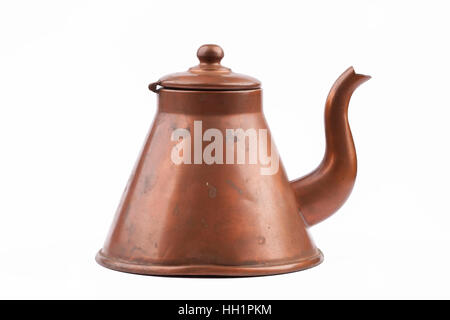 Antique old  copper tea kettle isolated on white background Stock Photo