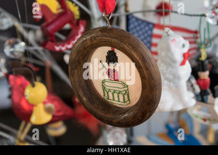 Vintage Hand Stitched Ornament on Wire Christmas Tree, USA Stock Photo