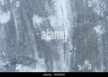 snow on concrete pavement Stock Photo