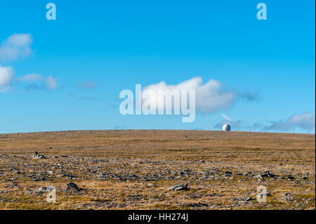 The globe on the roof of North Cape Hall monument rising from empty barren land in Nordkapp, Finnmark county, Norway. Stock Photo