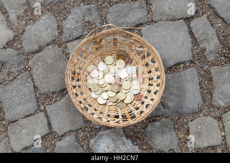 Euro coins in a basket Stock Photo