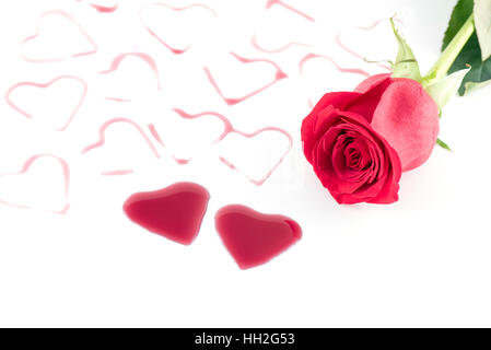 Heart shape from red wine and Rose flower on white background, Happy Valentine's Day Stock Photo