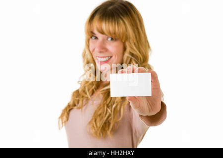 An attractive blonde woman with business card. Text space on blank card Stock Photo