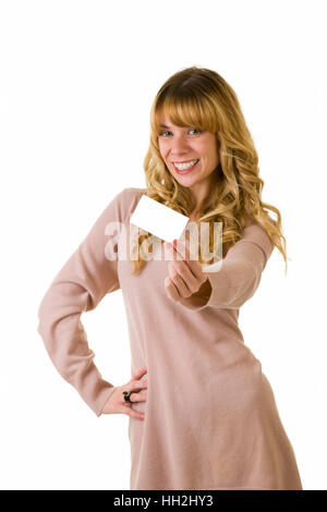 An attractive blonde woman with business card. Text space on blank card Stock Photo