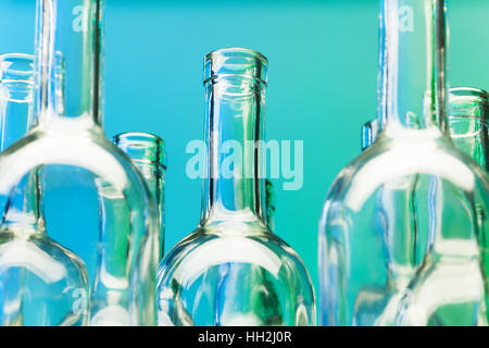Crystal bottlenecks of empty glass wine bottles Stock Photo