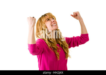 Woman throws arms up in success Stock Photo