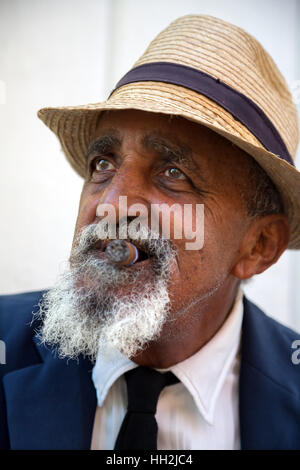 Man smoking Cohiba cigar in Trinidad, Cuba Stock Photo