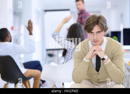 business, startup and people concept - happy creative team talking in office Stock Photo