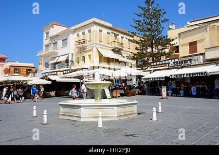 Fountain in the Pl El Venizelou square with tourists enjoying the sights, Chania, Crete, Greece, Europe. Stock Photo