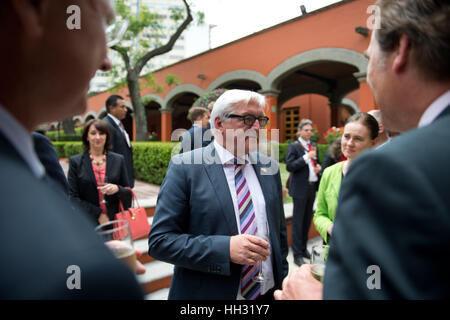 FILE - A file picture dated 17 July 2014 shows German Foreign Minister Frank-Walter Steinmeier (c, SPD) speaking to business representatives on the occasion of the signing of a new Kaufvertrag (lit. purchase contract) for the new BMW factory location in Mexico City, Mexico. Car manufacturer BMW plans to invest around 1 billion dollars in a new factory in San Luis Potosi. Photo: Bernd von Jutrczenka/dpa Stock Photo