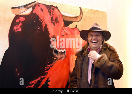 German-Polish painter Adam Pete pictured at the opening of the exhibition of his work titled 'Girls and Bulls' at Galerie Mensing in Duesseldorf, Germany, 15 Janaury 2017. The artist lives and works on the Spanish island of Majorca. Photo: Horst Ossinger//dpa Stock Photo