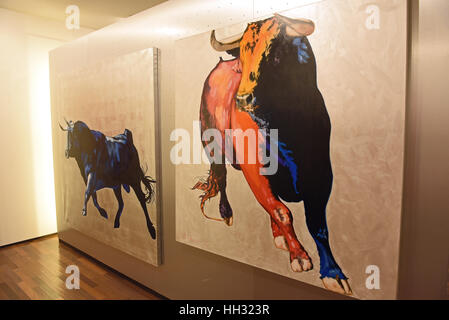 Pictures of bulls by German-Polish painter Adam Pete on show at the exhibition of his work titled 'Girls and Bulls' at Galerie Mensing in Duesseldorf, Germany, 15 Janaury 2017. The artist lives and works on the Spanish island of Majorca. Photo: Horst Ossinger//dpa Stock Photo