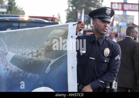 Los Angeles, USA. 16th Jan, 2017. Participants march in the 32nd annual Kingdom Day Parade. The parade is Southern California's largest Martin Luther King Jr. Day observance. The theme of this year's parade was ''Now More Than Ever, We All Must Work Together. Credit: Ringo Chiu/ZUMA Wire/Alamy Live News Stock Photo