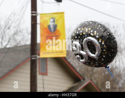 San Antonio, USA. 16th January, 2017. A balloon carried by a marcher emphasizes the 30th anniversary of the annual Martin Luther King Jr. march in San Antonio, Texas. Several thousand people attended the city's 30th anniversary march celebrating U.S. civil rights leader Martin Luther King, Jr. Credit: Michael Silver/Alamy Live News Stock Photo