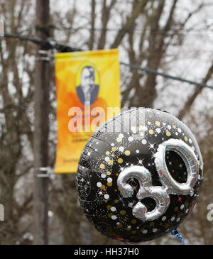 San Antonio, USA. 16th January, 2017. A balloon carried by a marcher emphasizes the 30th anniversary of the annual Martin Luther King Jr. march in San Antonio, Texas. Several thousand people attended the city's 30th anniversary march celebrating U.S. civil rights leader Martin Luther King, Jr. Credit: Michael Silver/Alamy Live News Stock Photo