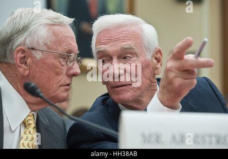 FILE PICS: 16th January 2017. Apollo 11 Commander Neil Armstrong, left, and retired Navy Captain and commander of Apollo 17 Eugene Cernana, confer prior to testifying at a hearing before the House Science and Technology Committee May 26, 2010 in Washington, DC. Gene Cernan, the last man to walk on the moon, died at 82 surrounded by his family on January 16, 2017. Credit: Planetpix/Alamy Live News Stock Photo