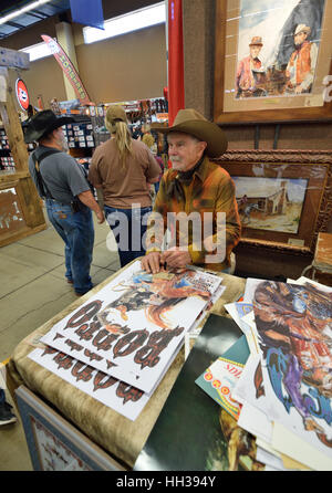 Ft. Worth, Texas, USA. 16th January, 2017. Cowboy artist and former Gunsmoke actor Buck Taylor visits the Ft. Worth Stock Show every year to help promote his art and he gladly talks about his acting career with fans. His latest movie is the Jeff Bridges western Hell or High Water. Credit:  Hum Images/Alamy Live News Stock Photo