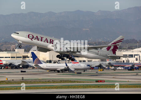 Los Angeles, USA - February 22, 2016: A Qatar Airways Boeing 777-200LR with the registration A7-BBC takes off from Los Angeles International Airport ( Stock Photo