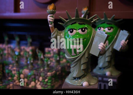 M&M's green character as Statue of Liberty candy dispenser displayed at M&M's world in Times Square, Manhattan, New York City. Stock Photo