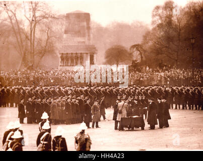 King George VI decorates and hands out medals to the crew of HMS Exeter, Ajax and Achilles on Horse Guards Parade. Stock Photo