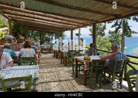 Greek restaurant on Monodendri beach, Paxos, Ionian Islands, Greek Islands, Greece, Europe Stock Photo